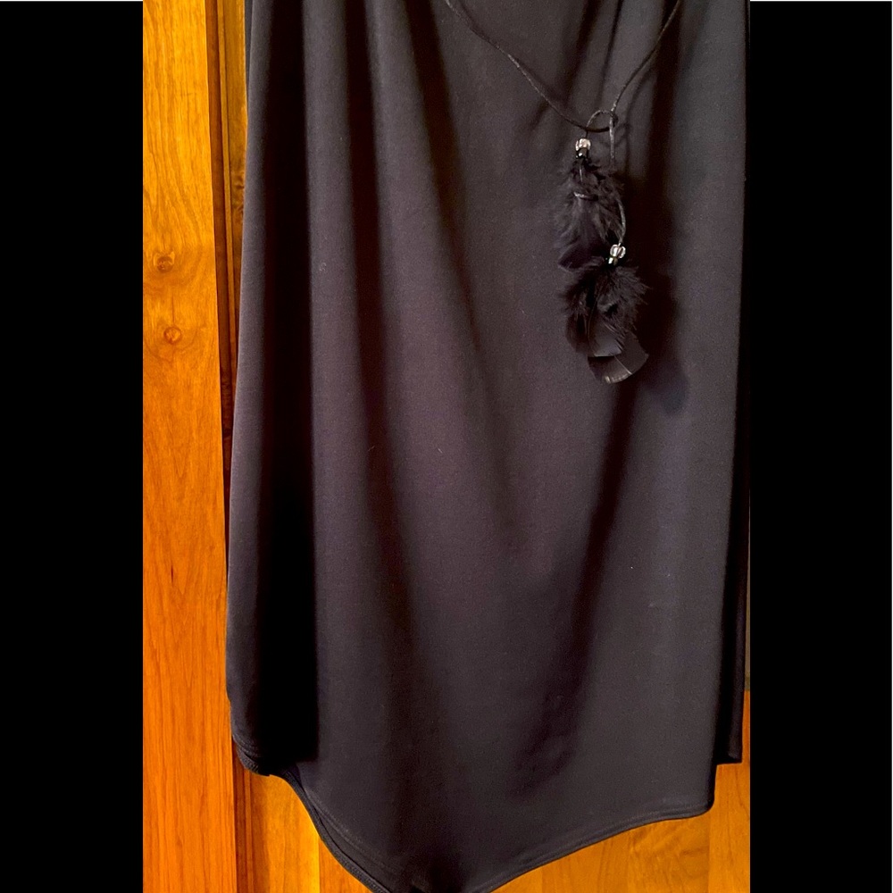 Handkerchief style black skirt with feather tie waist